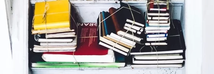 Stacks books bound together old